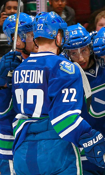 Canucks' Miller makes 20 saves to stifle former Sabres teammates